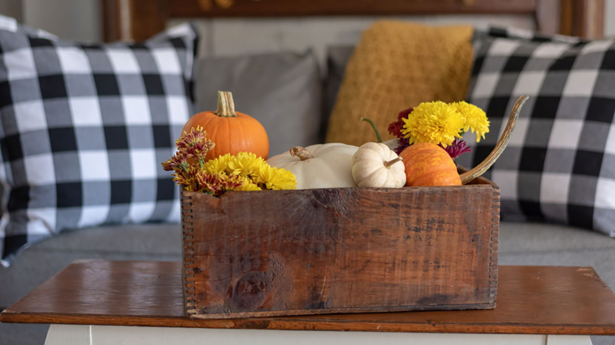 A fall seasonal display on living room table