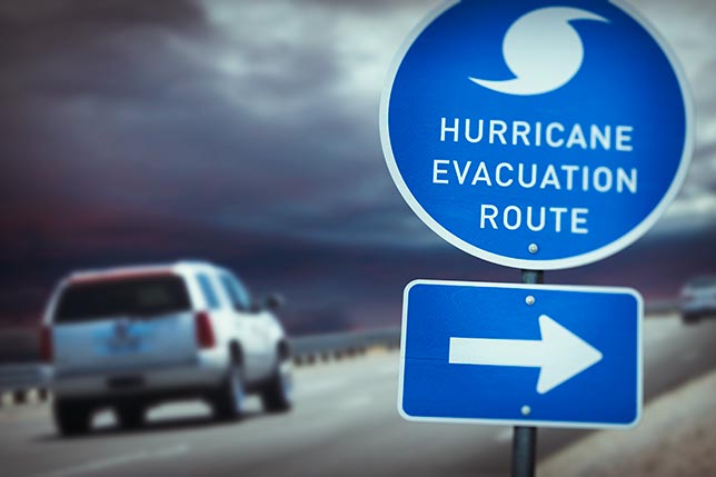 A car on a highway following a hurricane evacuation route