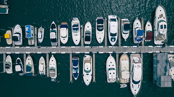 A group of boats in a dock in Saugatuck Douglas Michigan