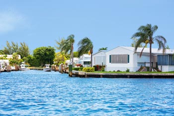A manufactured home near a picturesque tropical bay