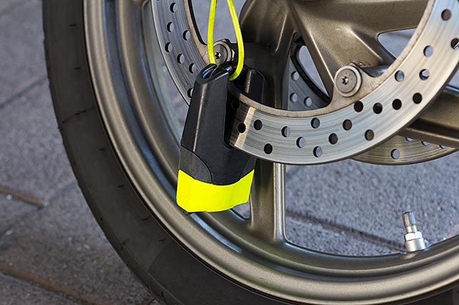 A wheel lock on a motorcycle tire