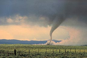A tornado in an open field
